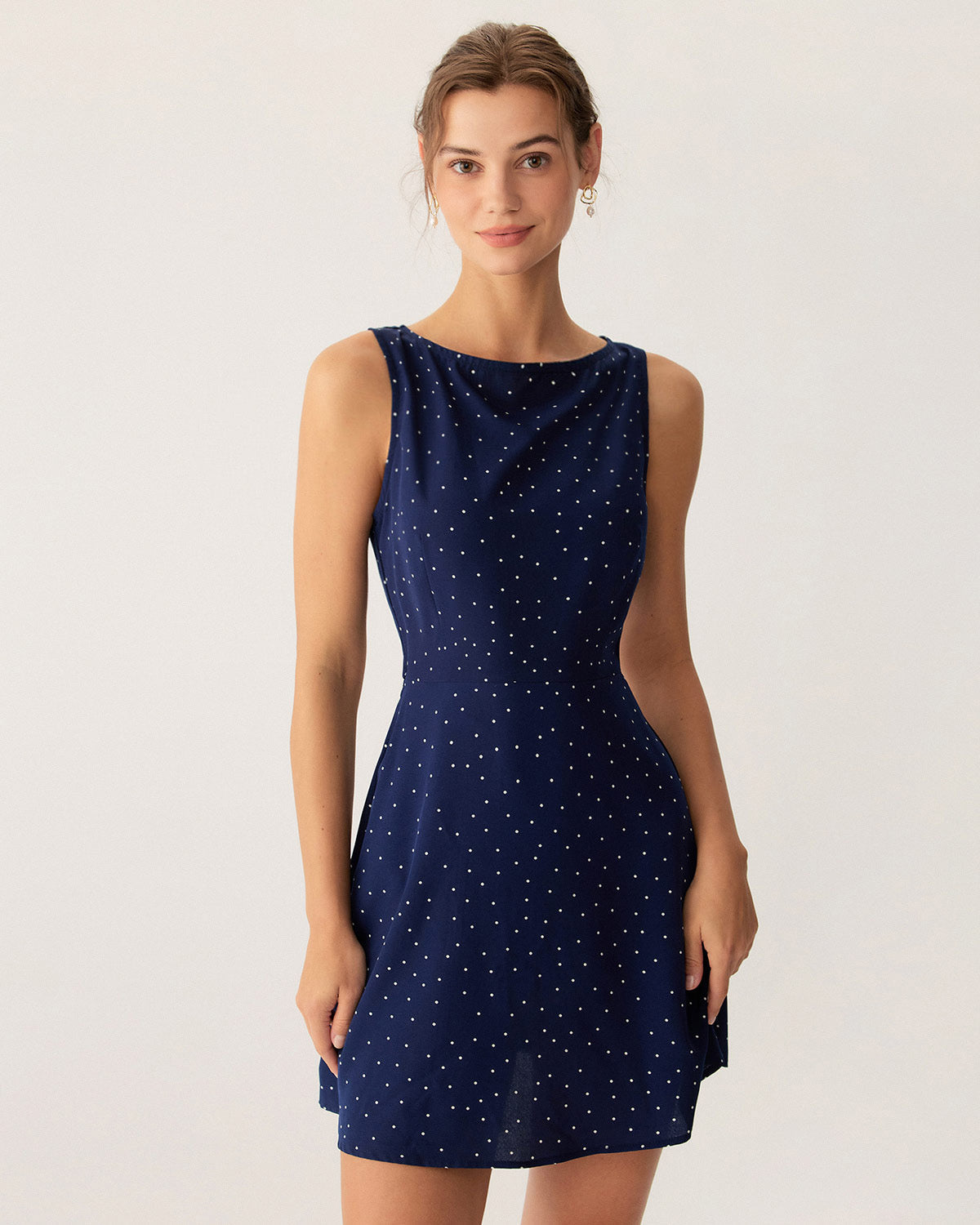 Élina | Navy Blue Mini Dress with Polka Dots and Back Cut-Out